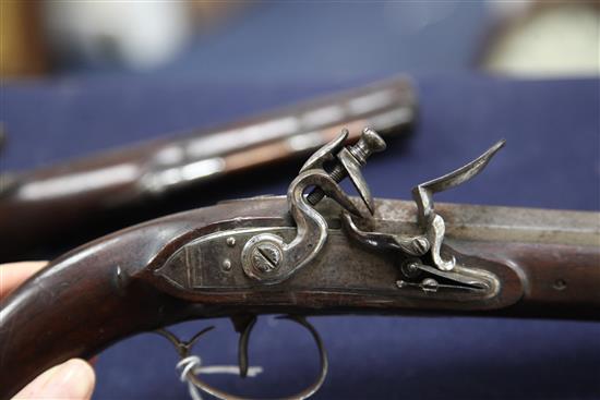 A pair of late 18th century flintlock holster pistols, 15in.